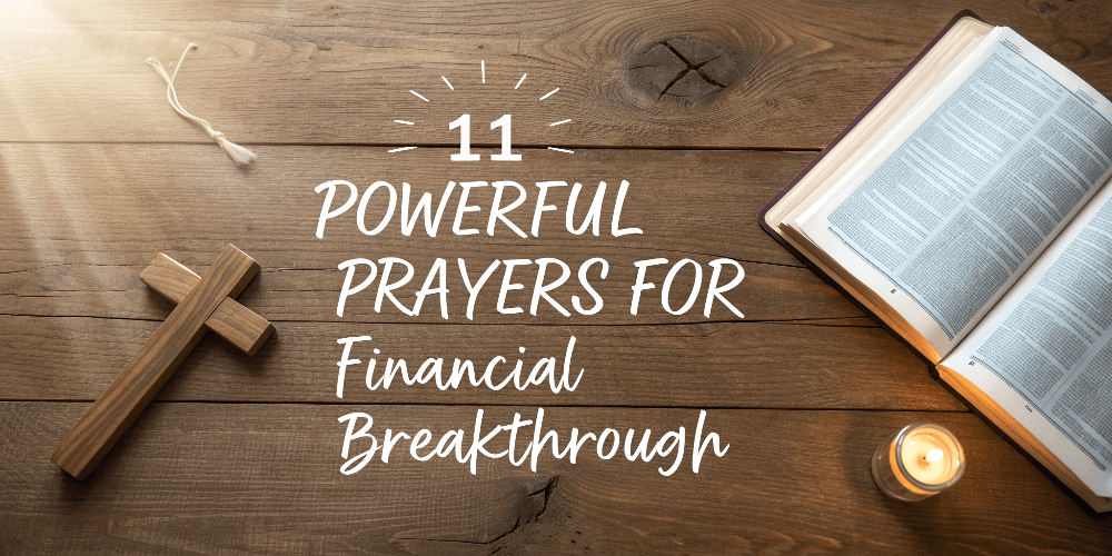 Wooden prayer board with the words ‘11 Powerful Prayers for Financial Breakthrough’ and Bible beside it